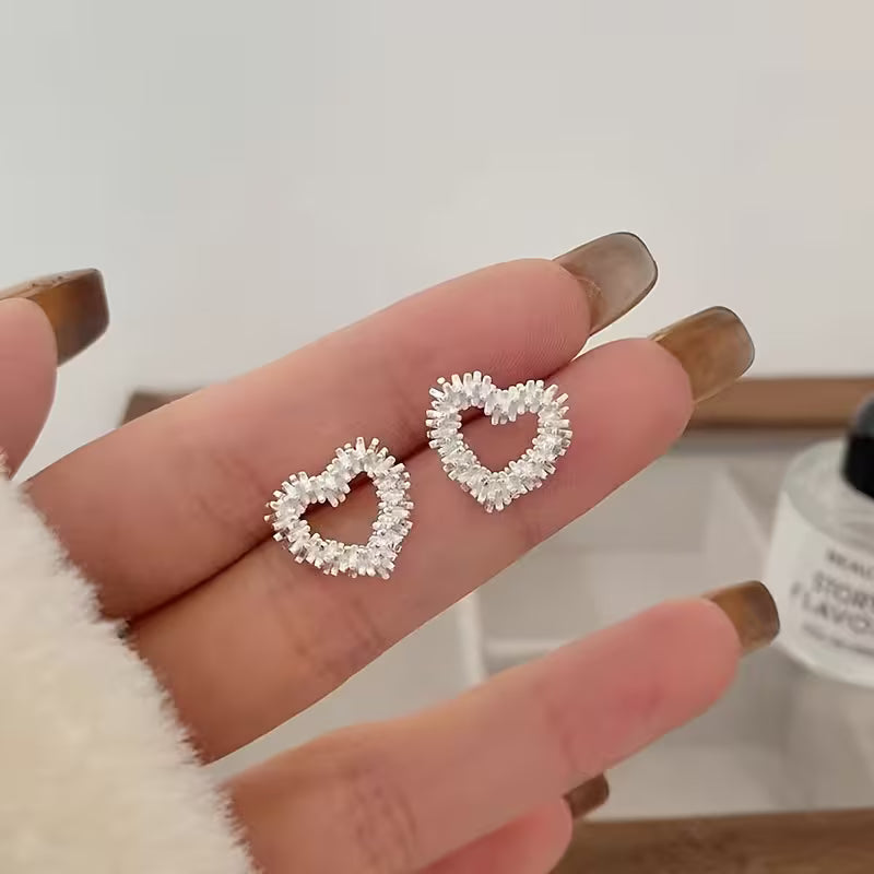 Silver Hollow Heart Stud Earrings — Sparkly Crystal Outline