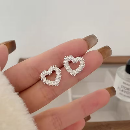 Silver Hollow Heart Stud Earrings — Sparkly Crystal Outline
