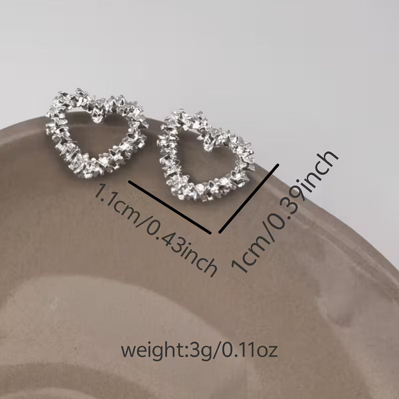 Silver Hollow Heart Stud Earrings — Sparkly Crystal Outline